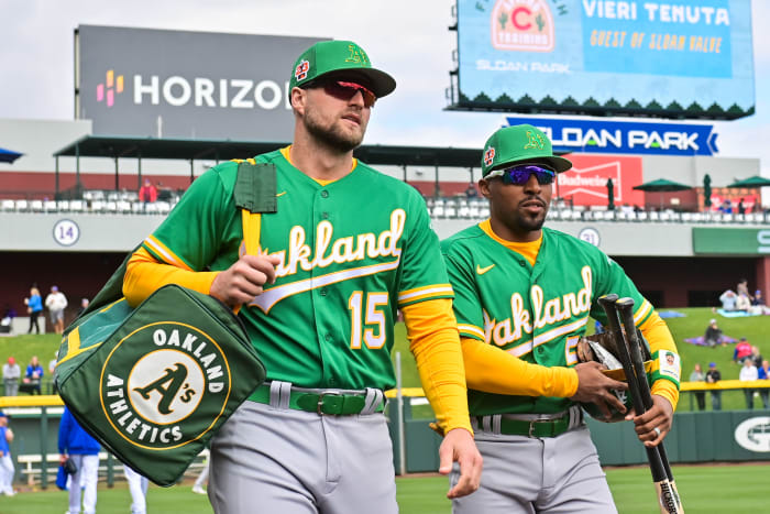 Mar 2, 2023; Mesa, Arizona, USA; Oakland Athletics first baseman Seth Brown (15) and second baseman Tony Kemp (5) look on prior to a Spring Training game against the Chicago Cubs at Sloan Park . Mandatory Credit: Matt Kartozian-USA TODAY Sports